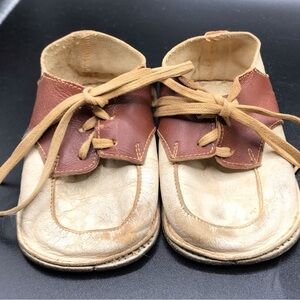 Used vintage brown/cream leather baby shoes decor